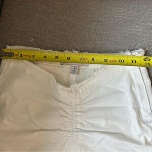 Urban Outfitters white ruched denim distressed mini skirt